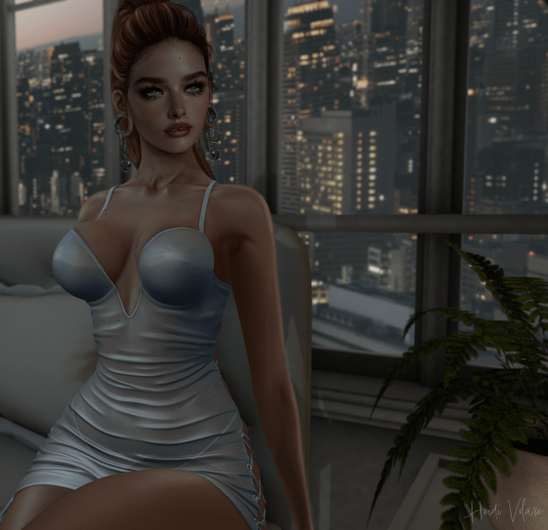 Image of a female avatar with red hair in a pony tail wearing a silver-blue cocktail dress sitting on a bed with the city skyline behind her.