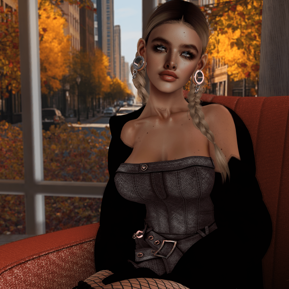 Image a female avatar with dark blonde braids sitting on an orange chair wearing a dark denim dress.