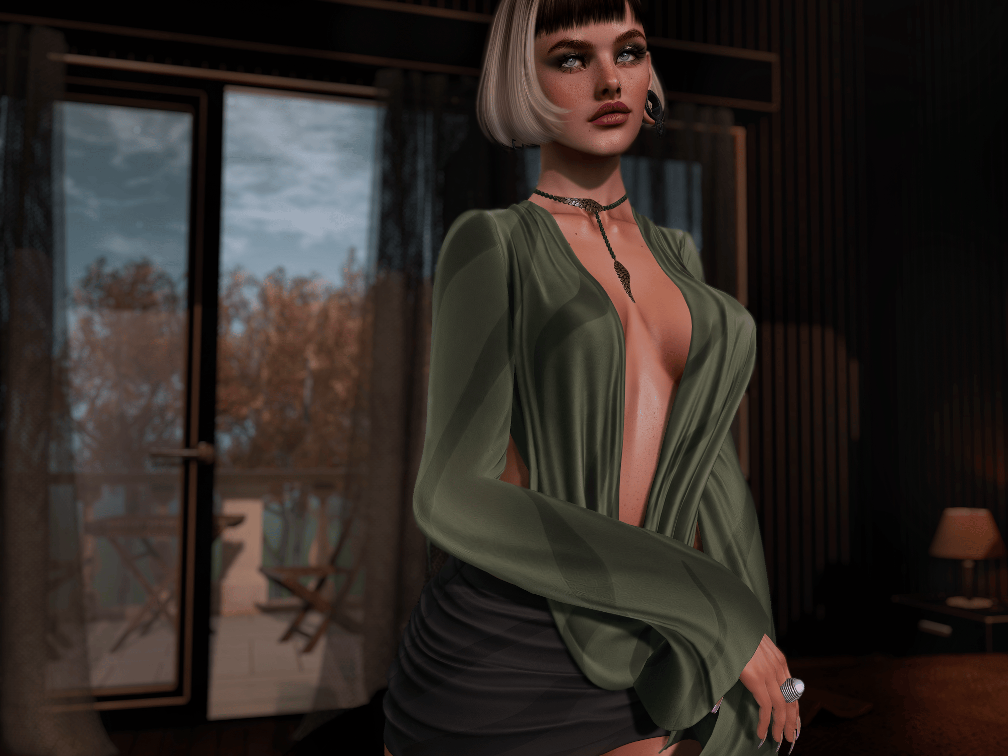 A stylish woman with a sleek blonde bob and dark bangs poses in a dimly lit, elegant room, wearing an olive-green blouse, a black skirt, and delicate jewelry. Her striking gaze and composed expression create a mysterious, sultry mood, while warm lighting and autumn foliage outside the windows add to the cinematic atmosphere.